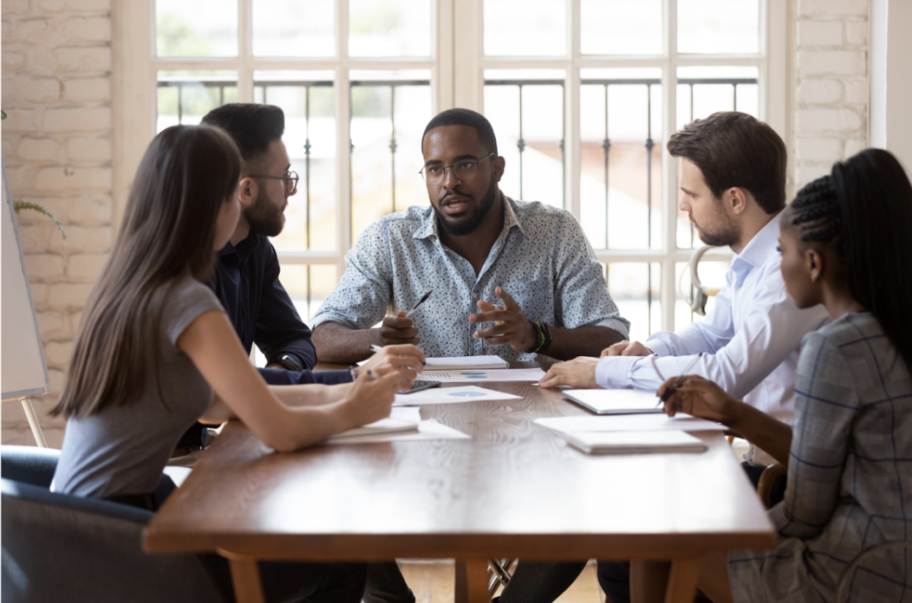 Professionals gathered around a table